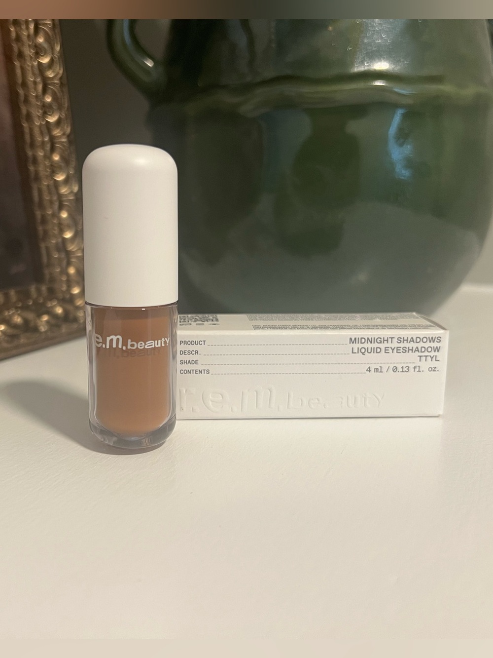 REM beauty liquid eyeshadow in the shade ttyl.
